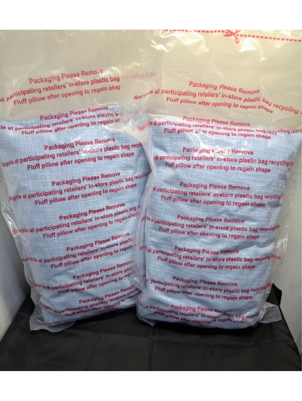 2 baby blue textured target Room Essentials throw pillows.  New in package